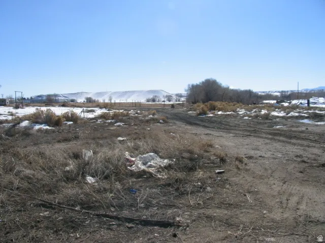View of yard featuring a mountain view and a rural view