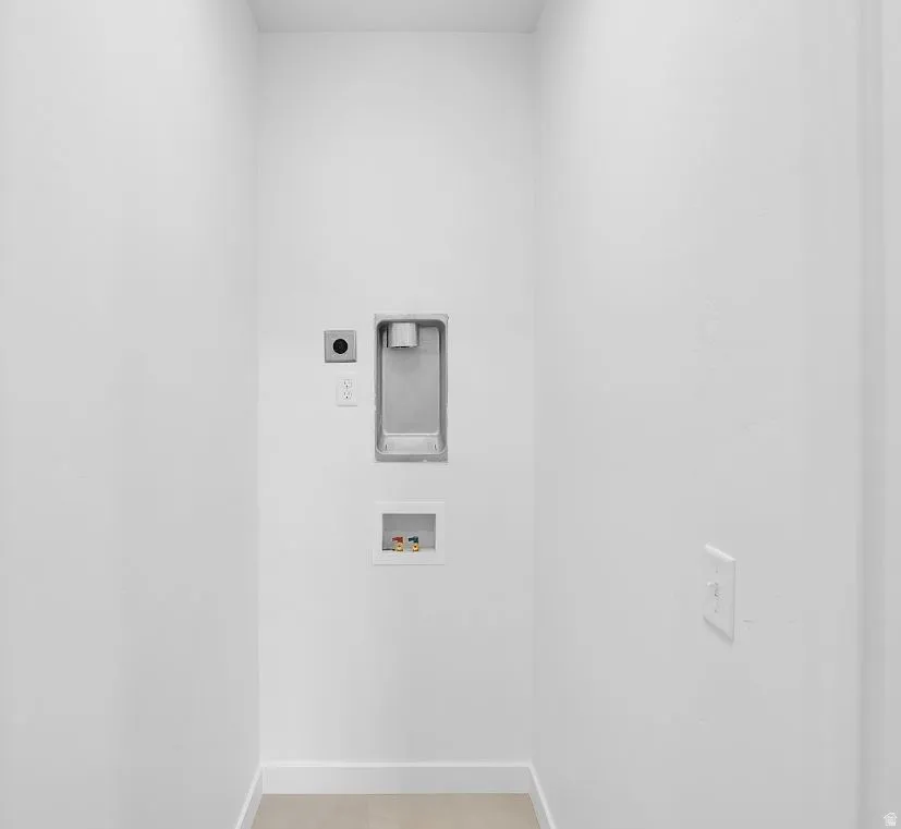 Laundry room featuring washer hookup and hookup for an electric dryer