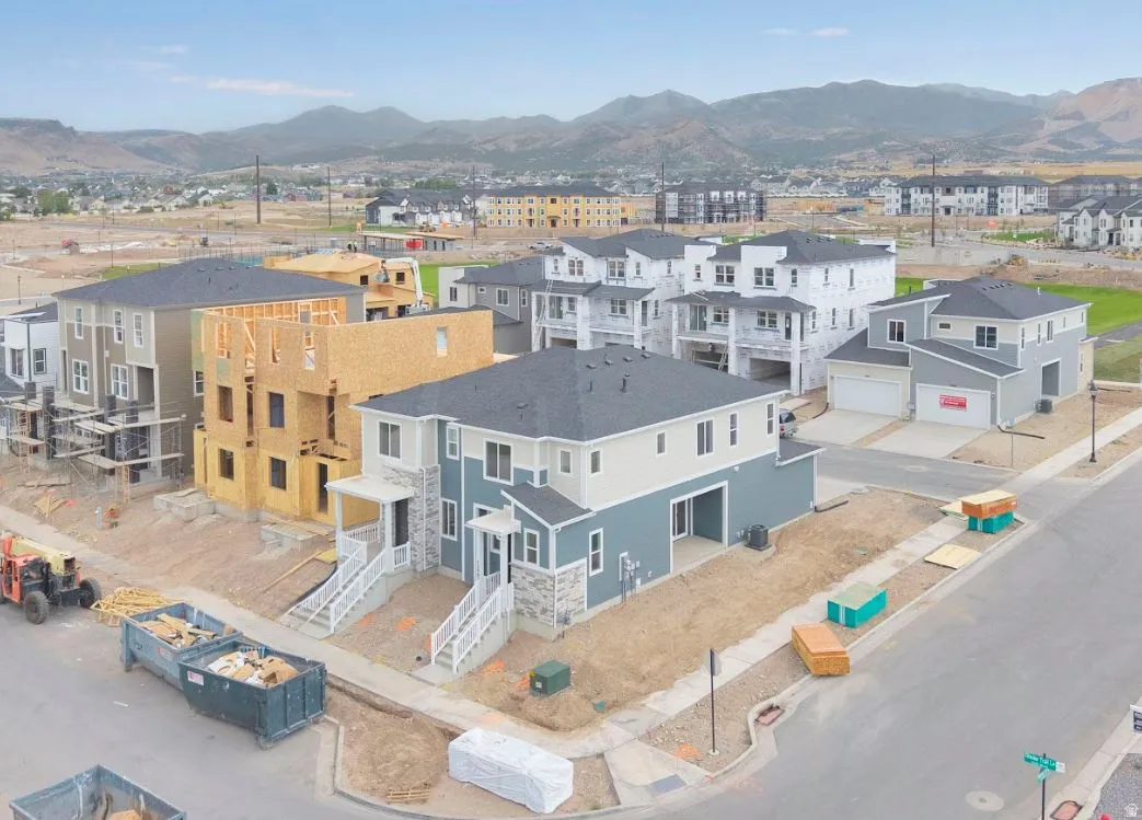 Aerial view of residential area with mountains