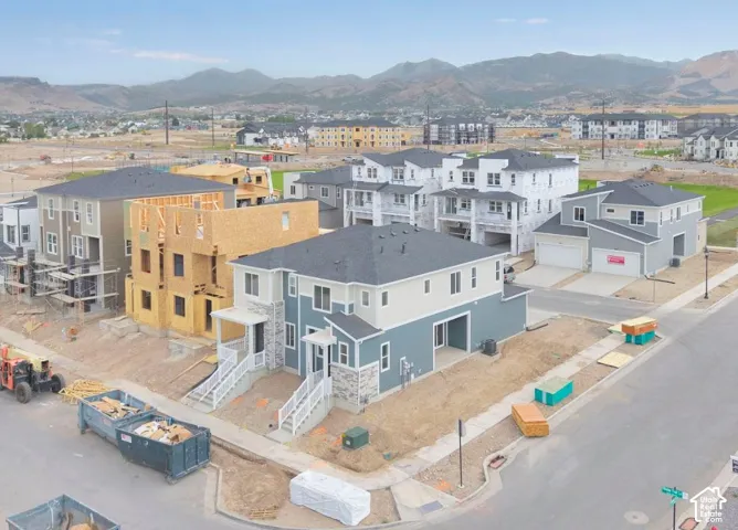 Aerial view of residential area with mountains
