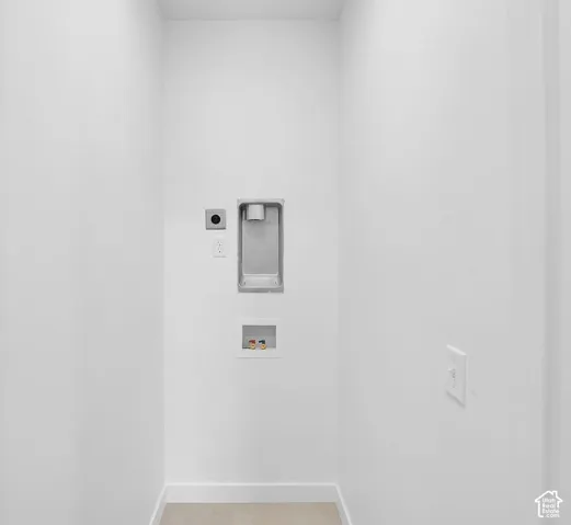 Laundry room featuring washer hookup and hookup for an electric dryer