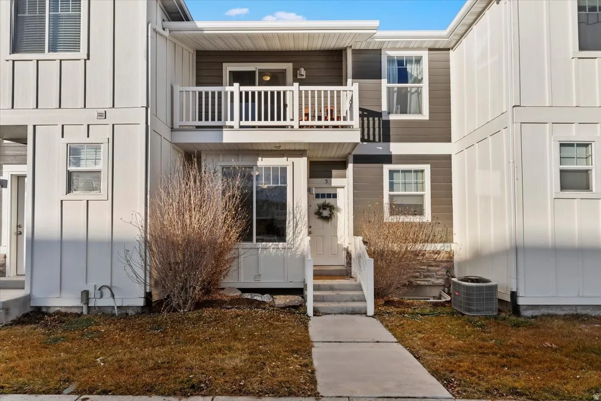 Entrance to property with board and batten siding