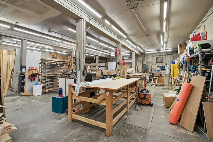 Misc room with a workshop area