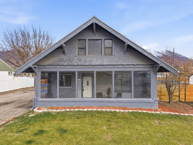 Bungalow-style home featuring a sunroom
