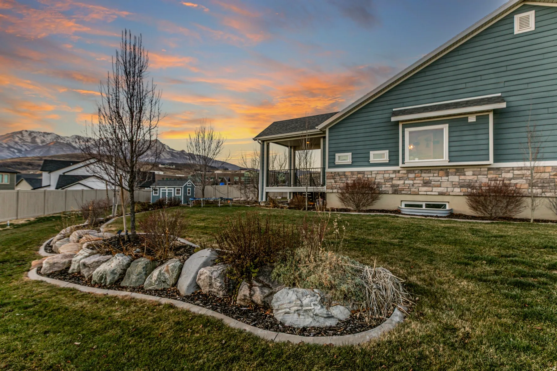 View of yard featuring a sunroom