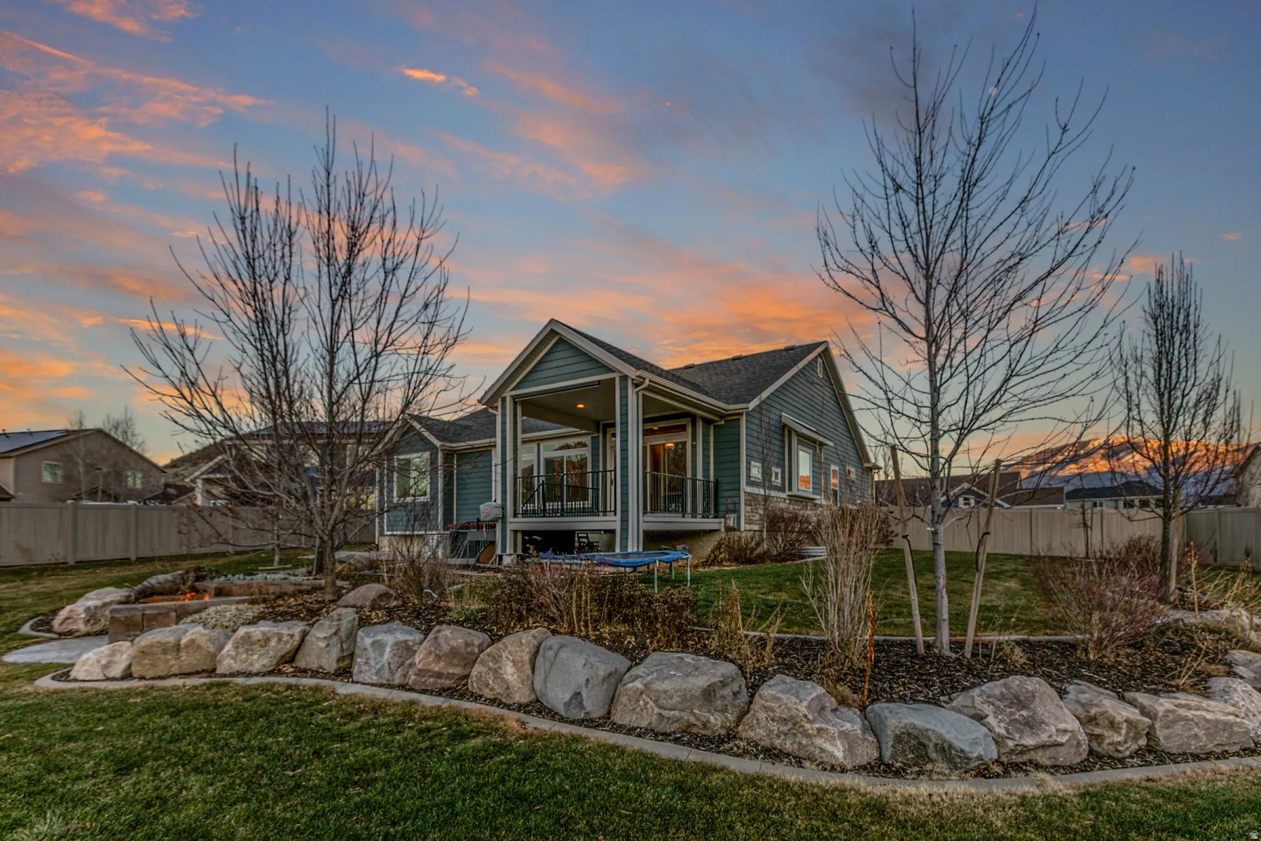 Rear view of property with a patio