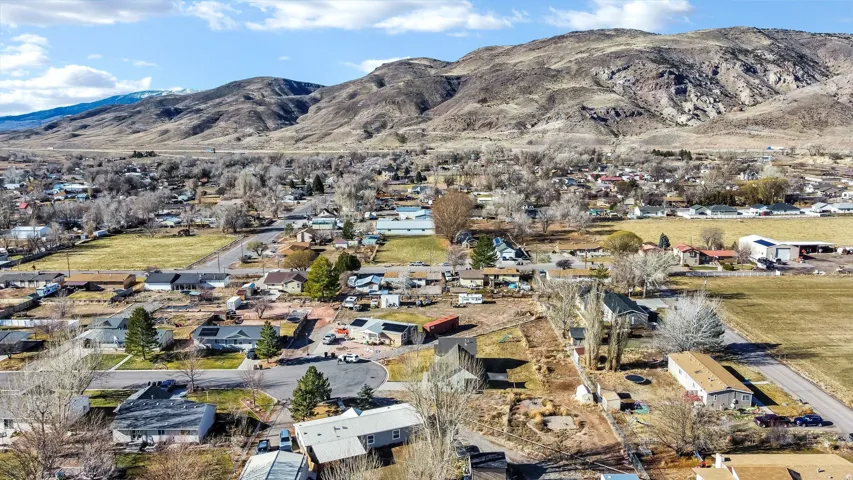 View of mountain background featuring nearby suburban area