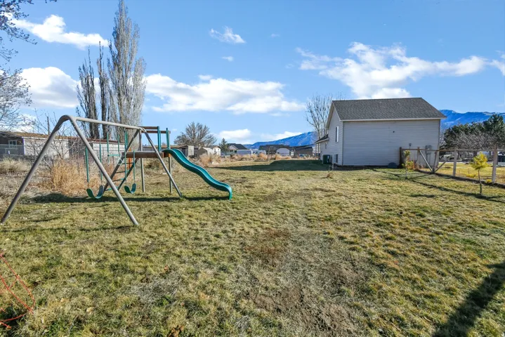 View of yard with a playground