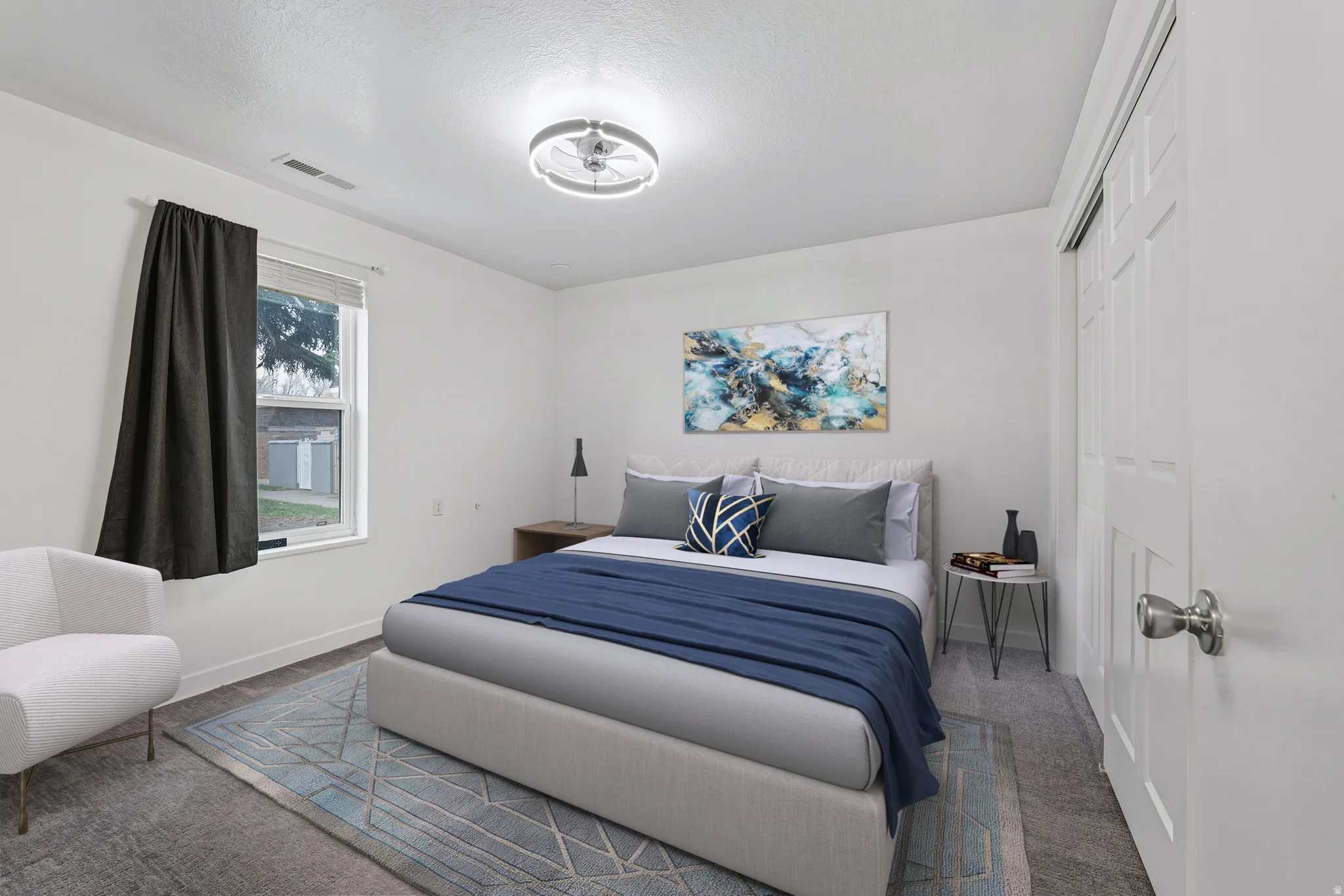 Carpeted bedroom featuring a closet and baseboards