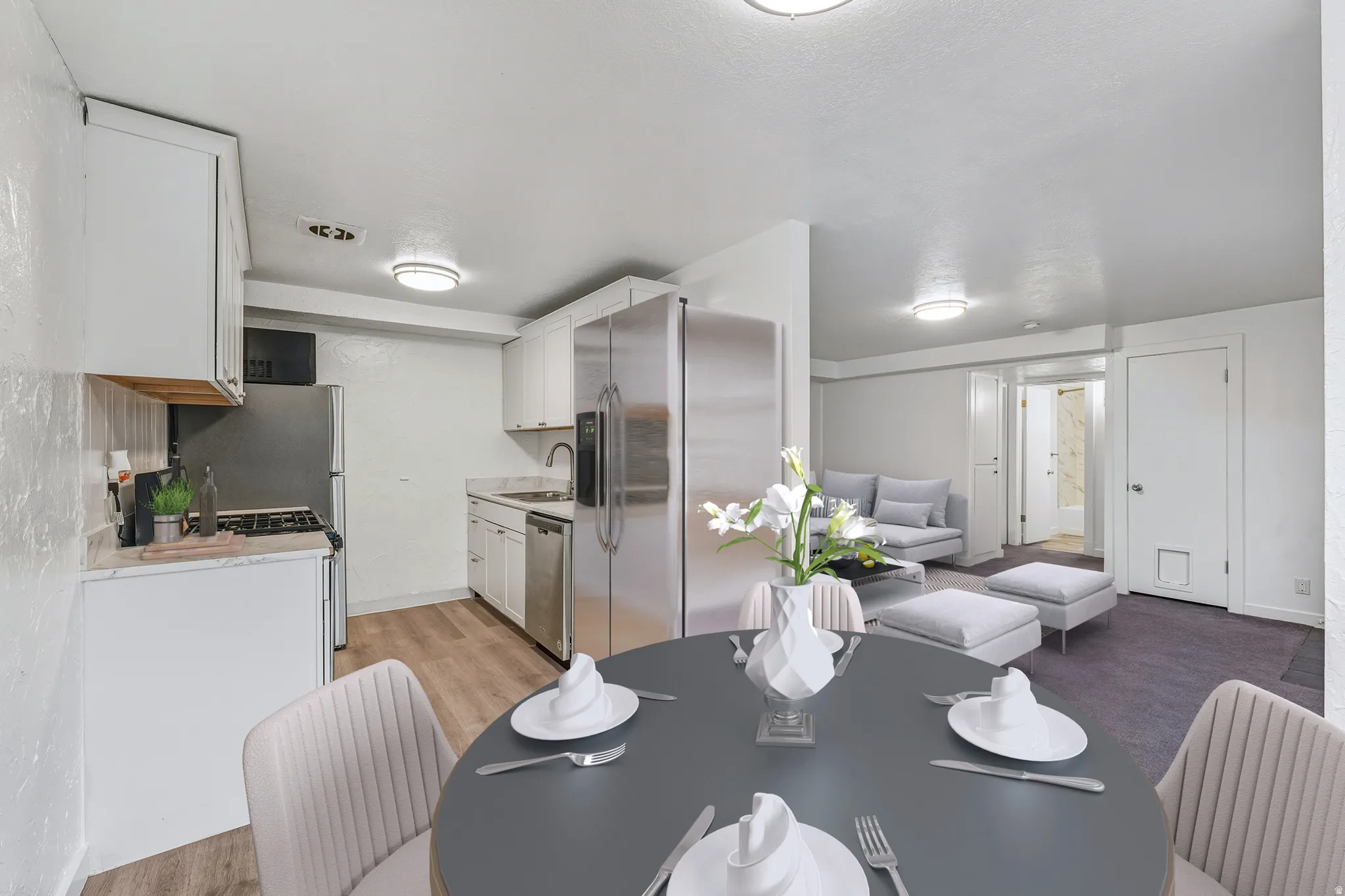 Dining space with light wood-style flooring