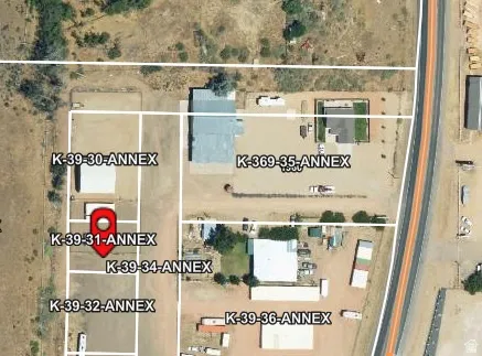 Aerial overview of property's location featuring property parcels