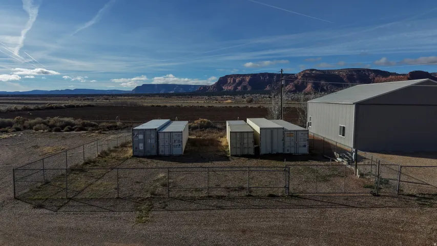Containers not included. Lot is fenced