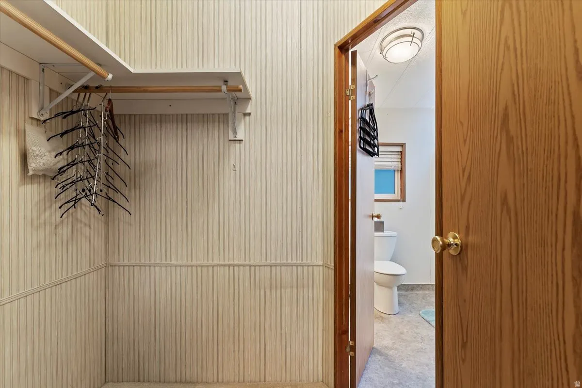 Full bathroom with a shower and toilet