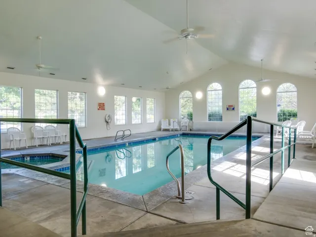 Indoor pool with a ceiling fan