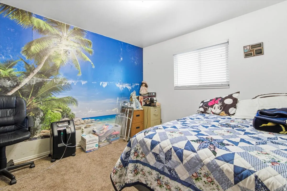 View of carpeted bedroom