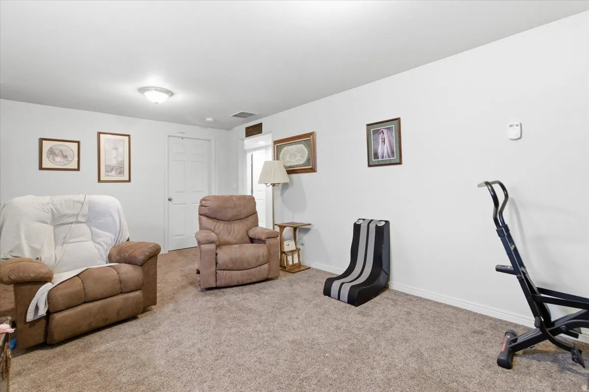 Office area with carpet flooring and baseboards
