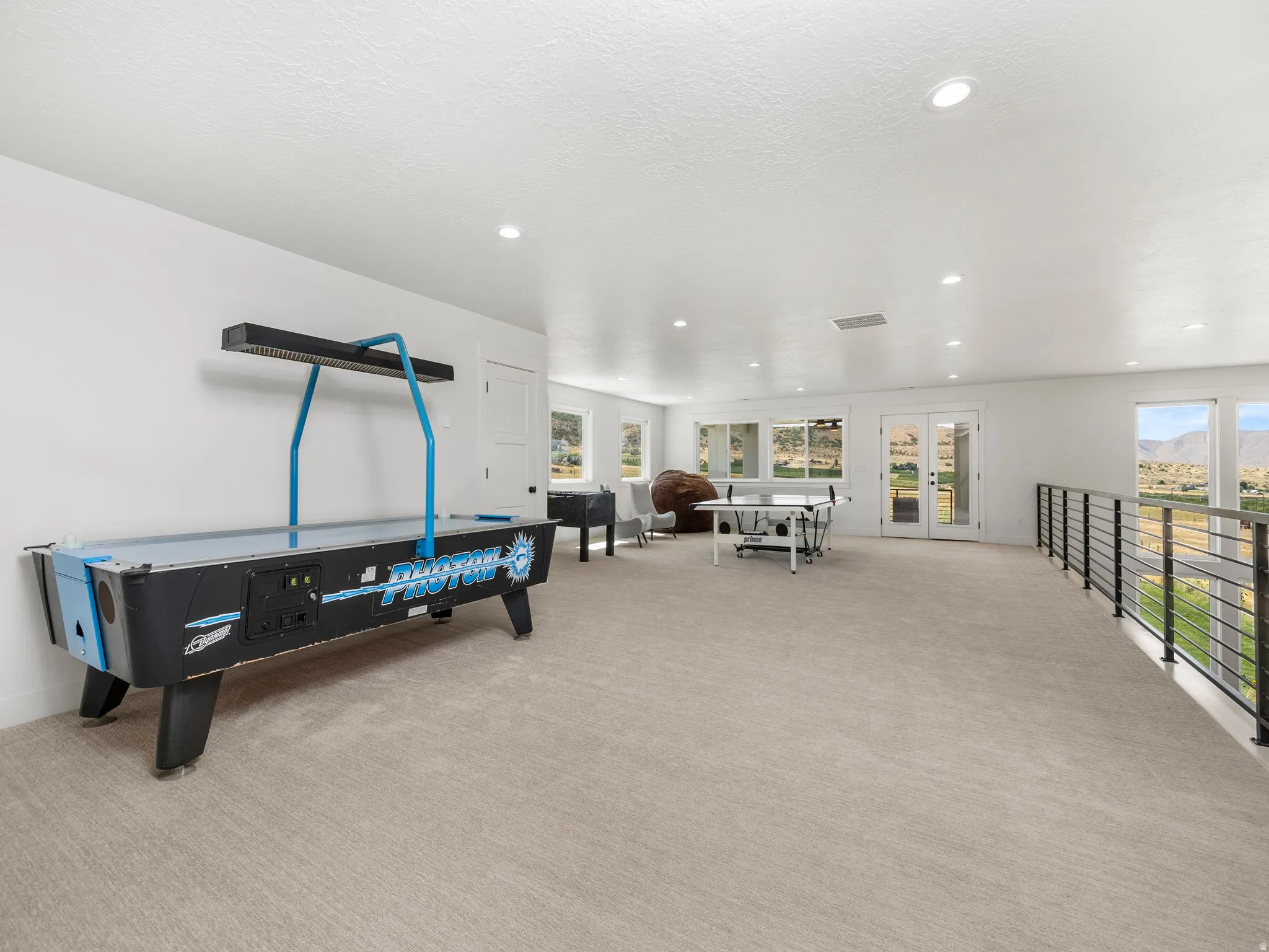The largest loft you are likely every going to see, with access to a covered back deck!