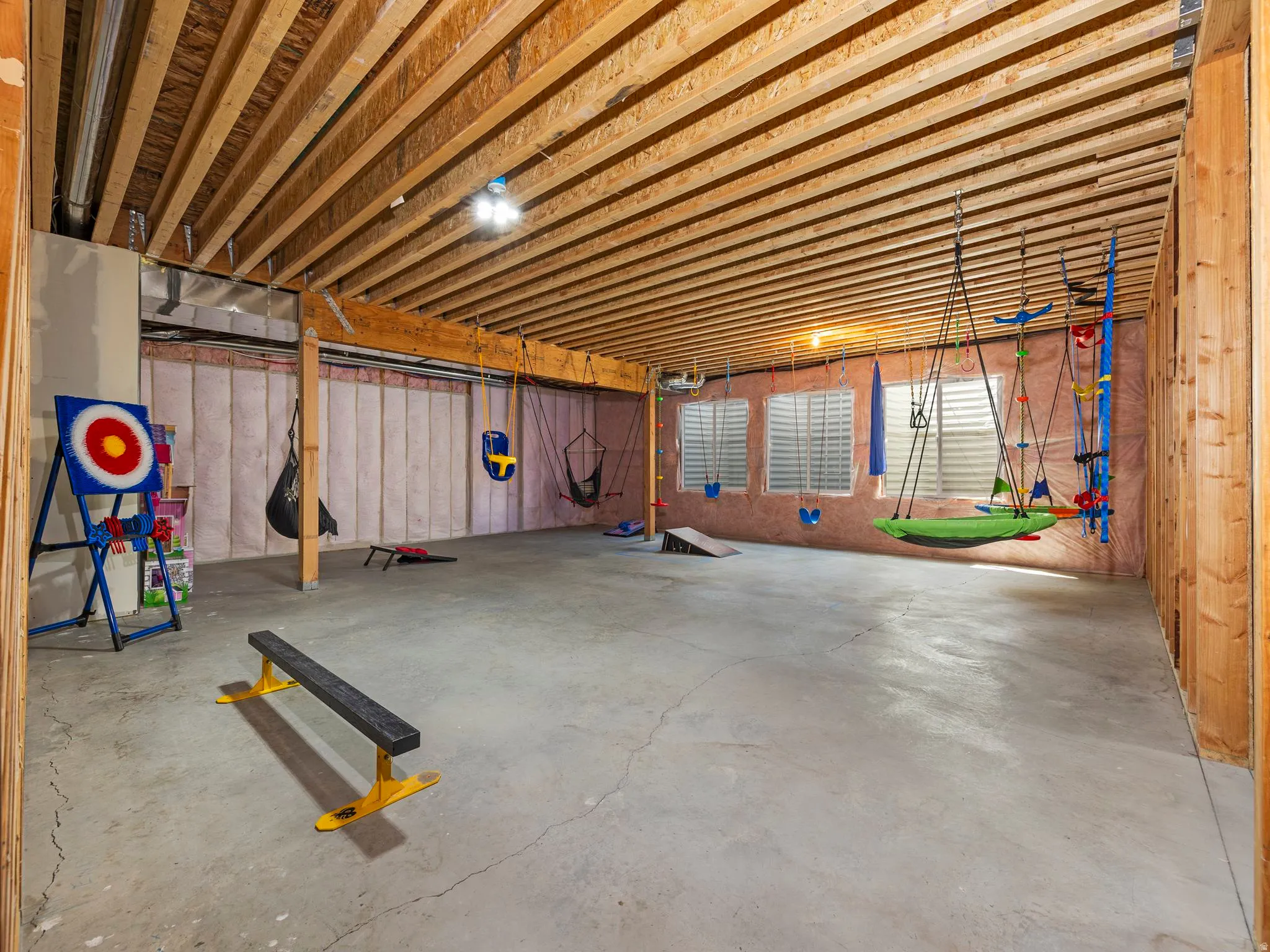 HUGE basement family room with three large windows