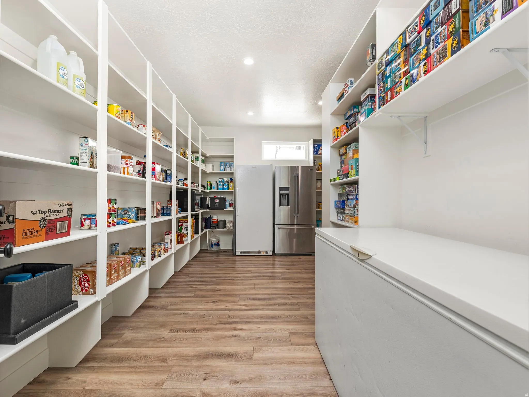 HUGE (bedroom sized) pantry with room for a 6 foot chest freezer and two fridges (in addition to all of the shelves)