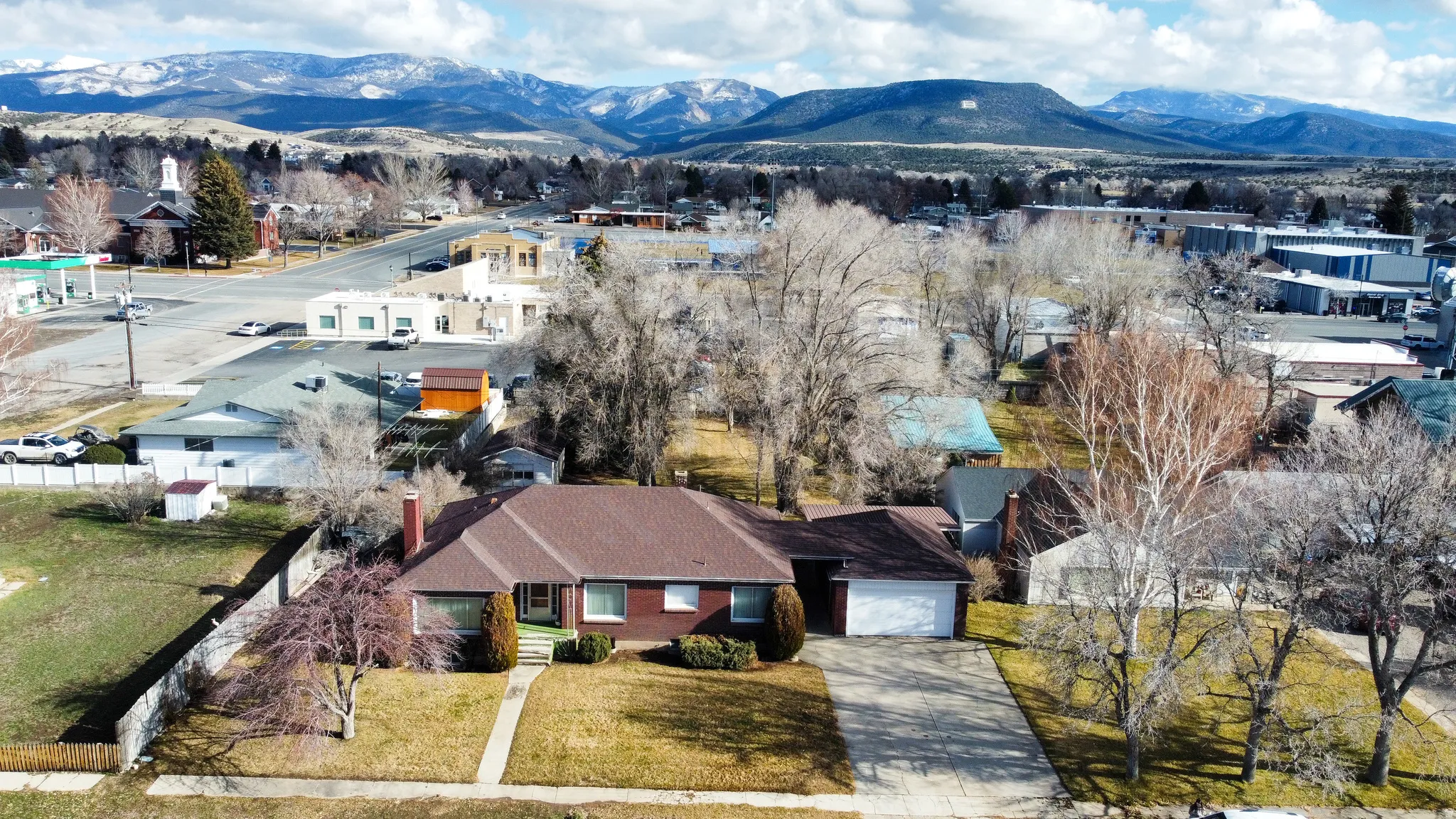 Aerial perspective of suburban area featuring mountains