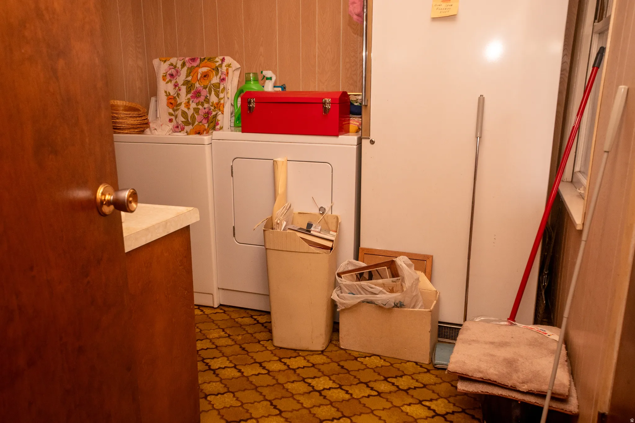 Laundry room featuring washing machine and clothes dryer