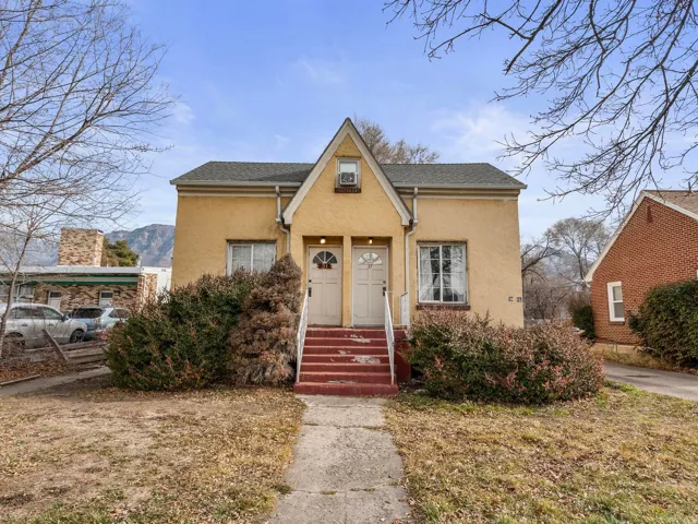 Front of well maintained 4-Plex in prime Provo location; entrances to 2 upstairs units; left entrance is the 1 bedroom upstairs unit; right entrance is the 2 bedroom unit