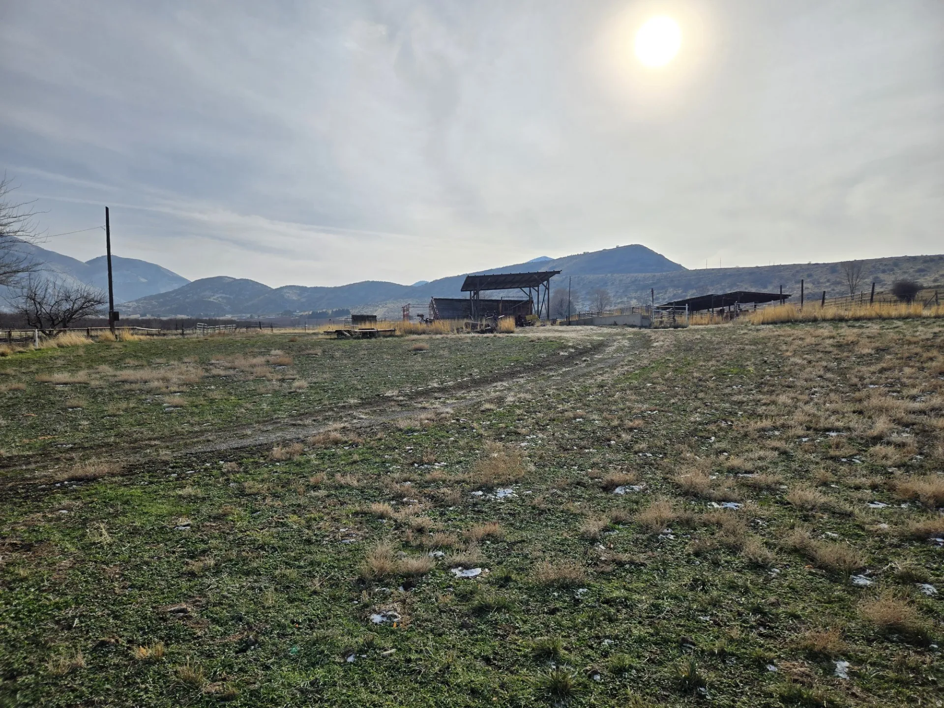 View of mountain background featuring rural landscape