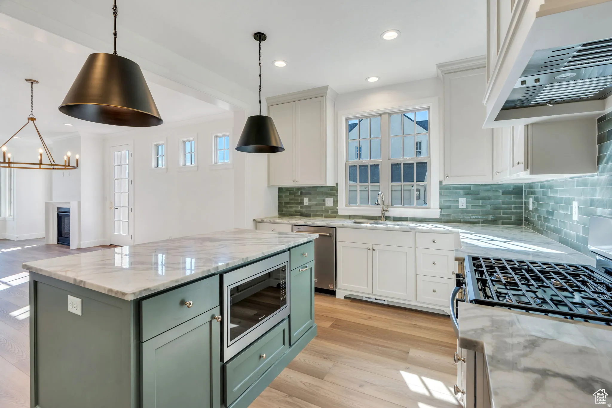 Large island provides extra prep space and has a built-in microwave