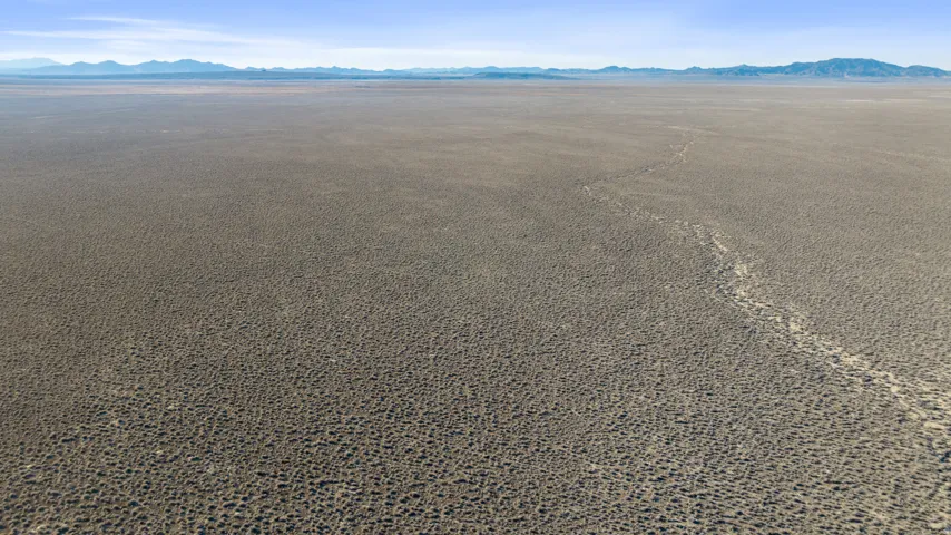 Bird's eye view of a mountainous background