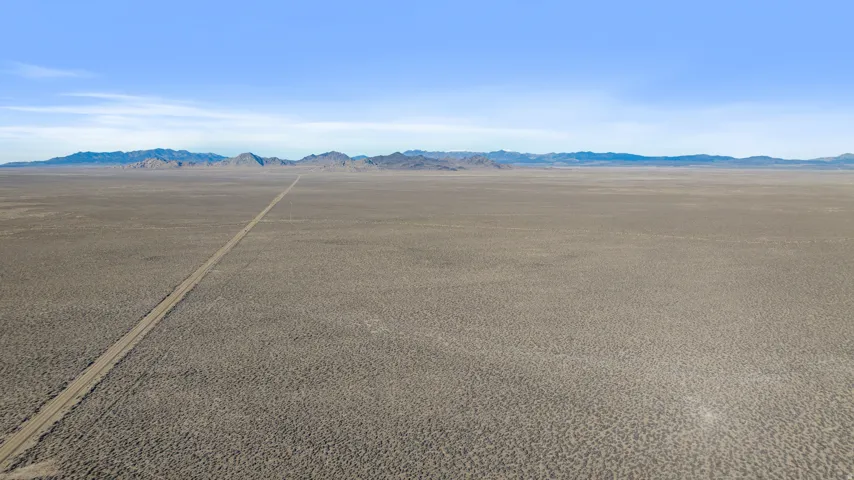 View of asphalt road featuring a mountain view
