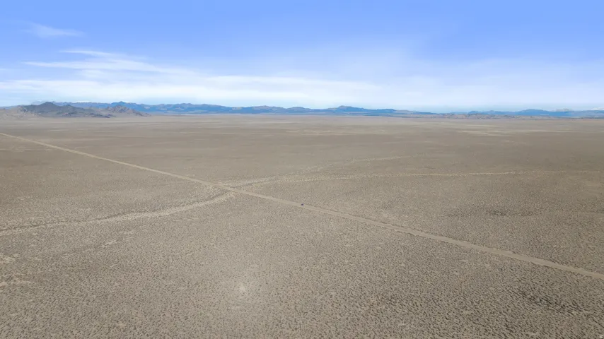 View of parking with a view of rural / pastoral area, a mountain view, and view of desert landscape