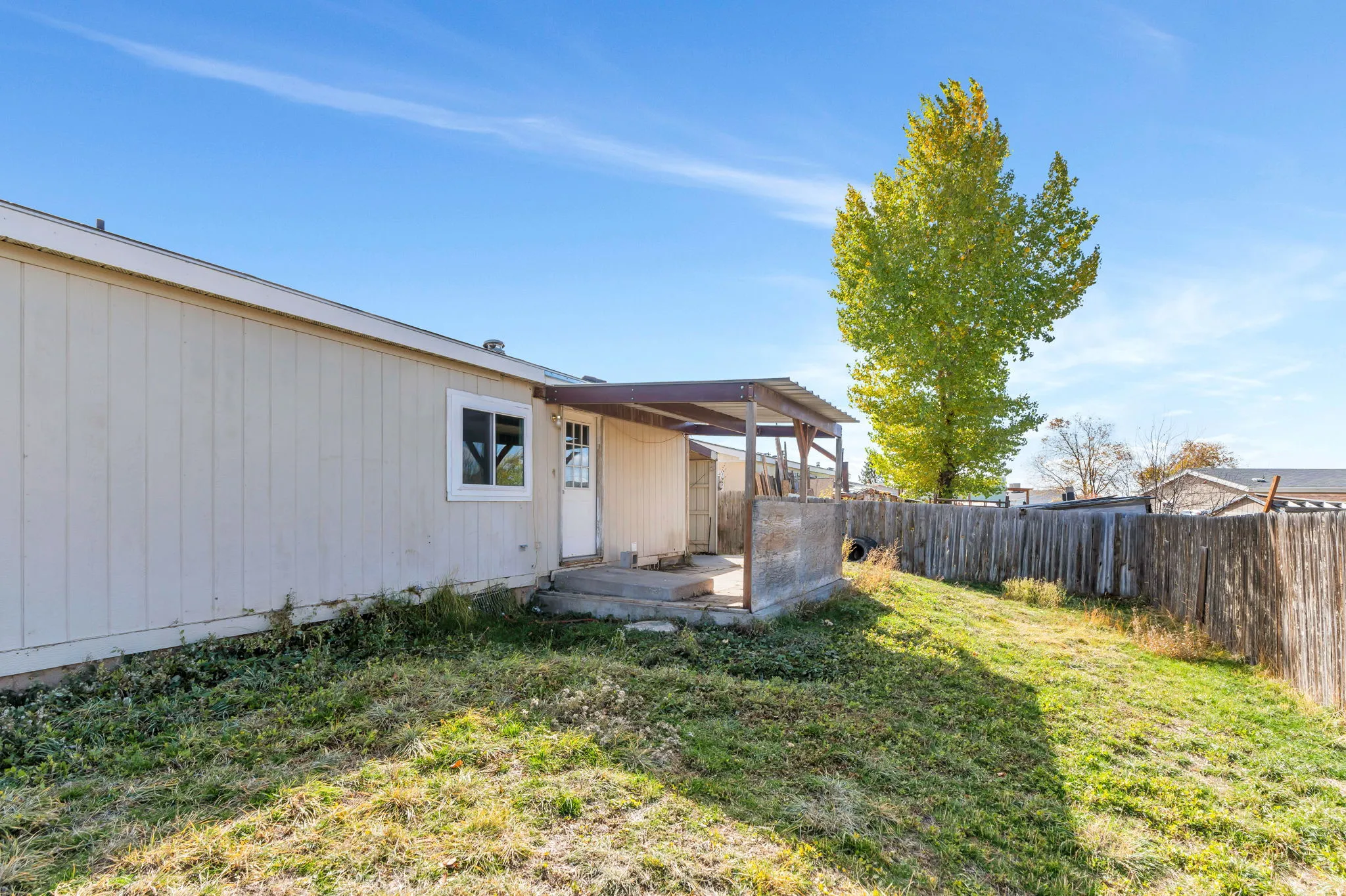 View of fenced backyard