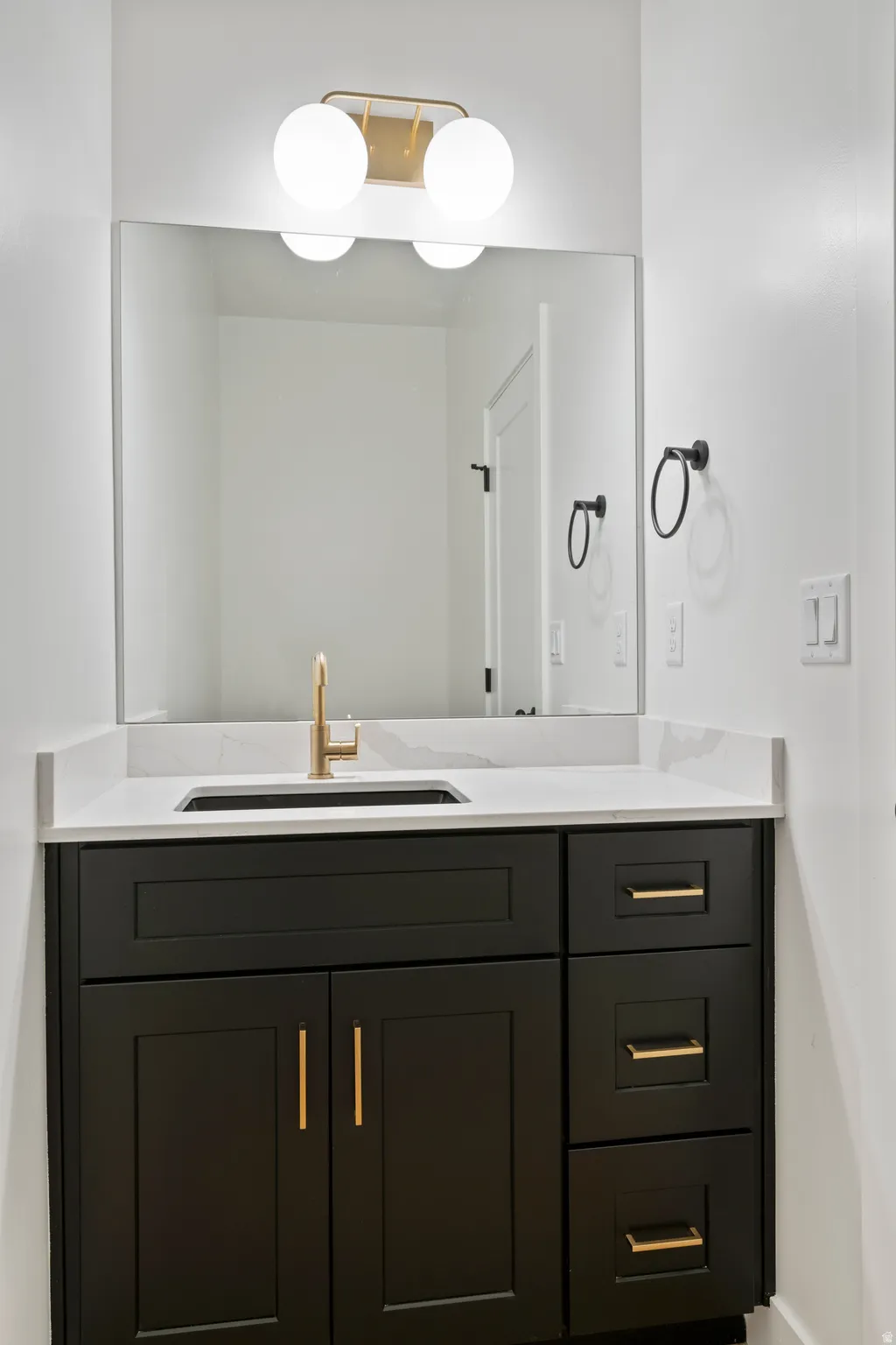 Bathroom featuring vanity