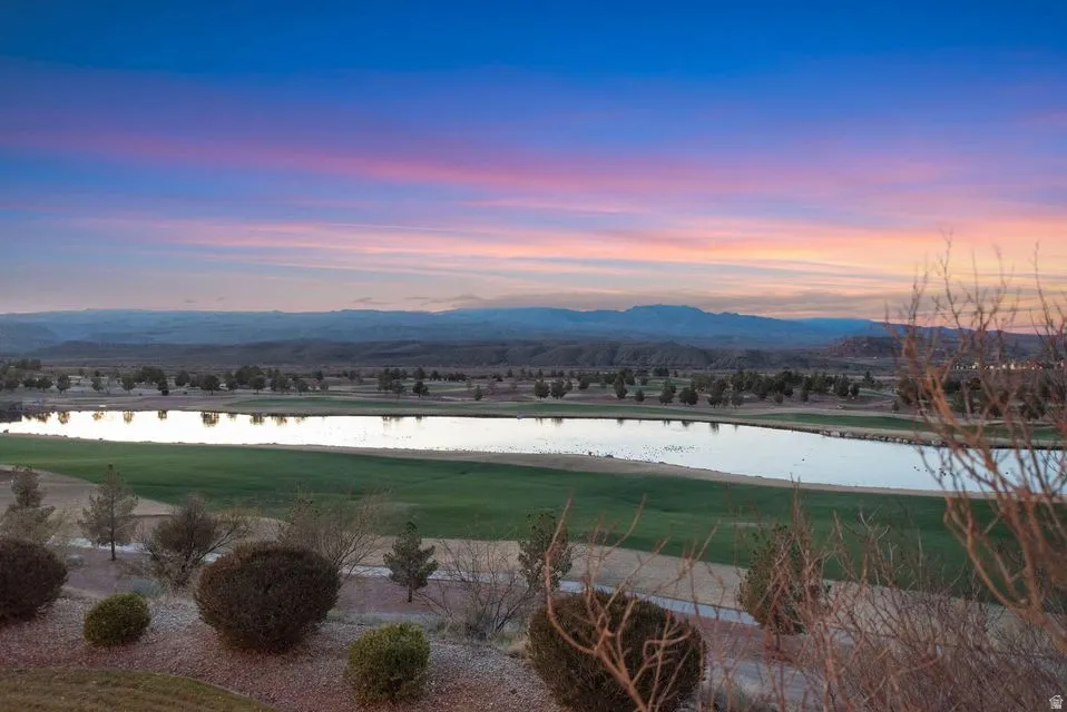 View of mountain backdrop featuring a large body of water