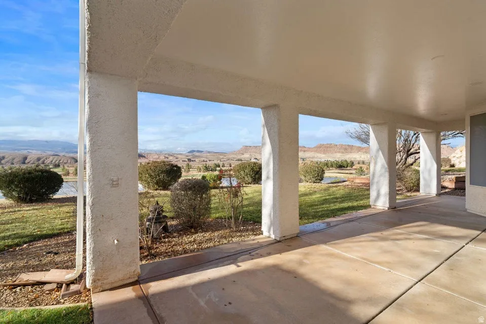 View of patio / terrace with a mountain view