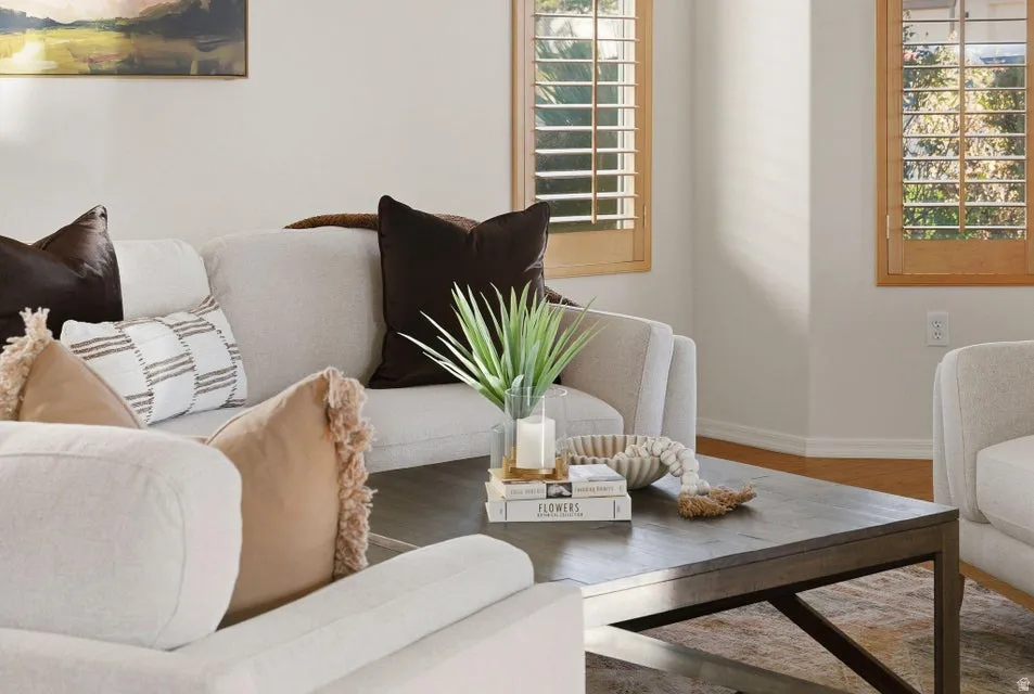 Living area featuring wood finished floors and healthy amount of natural light
