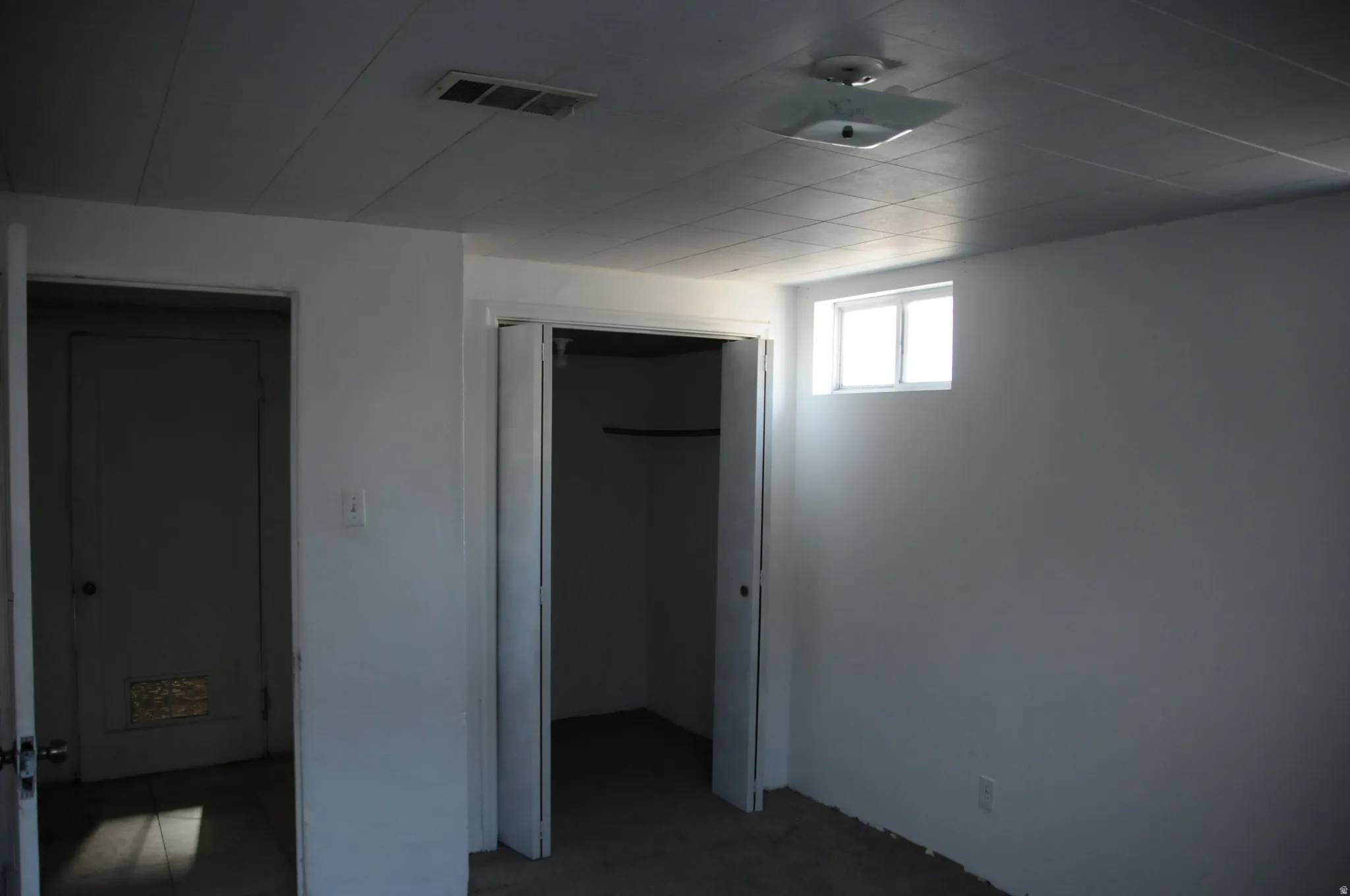 Unfurnished bedroom featuring a closet