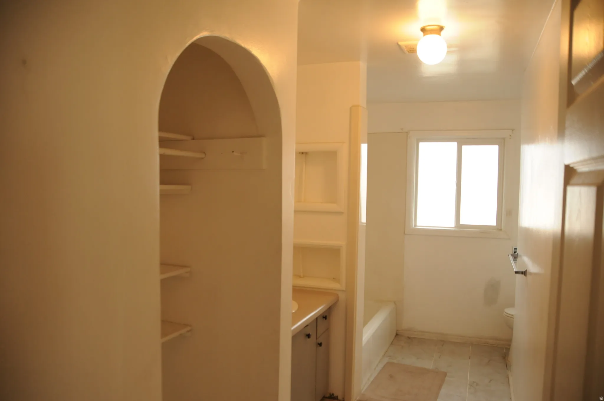 Full bath featuring toilet and vanity
