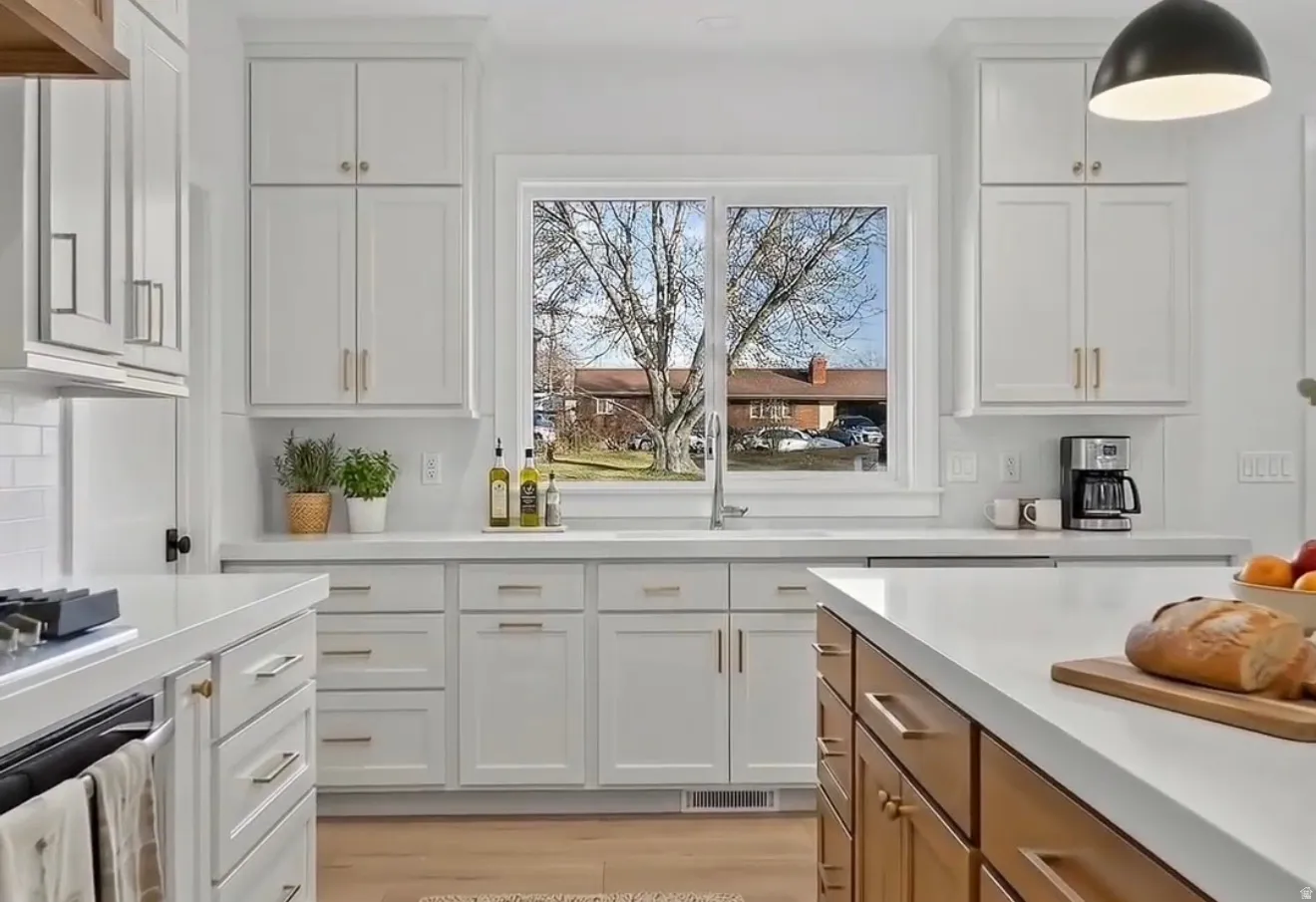 Virtually staged farmhouse kitchen sink and window in the Kitchen
