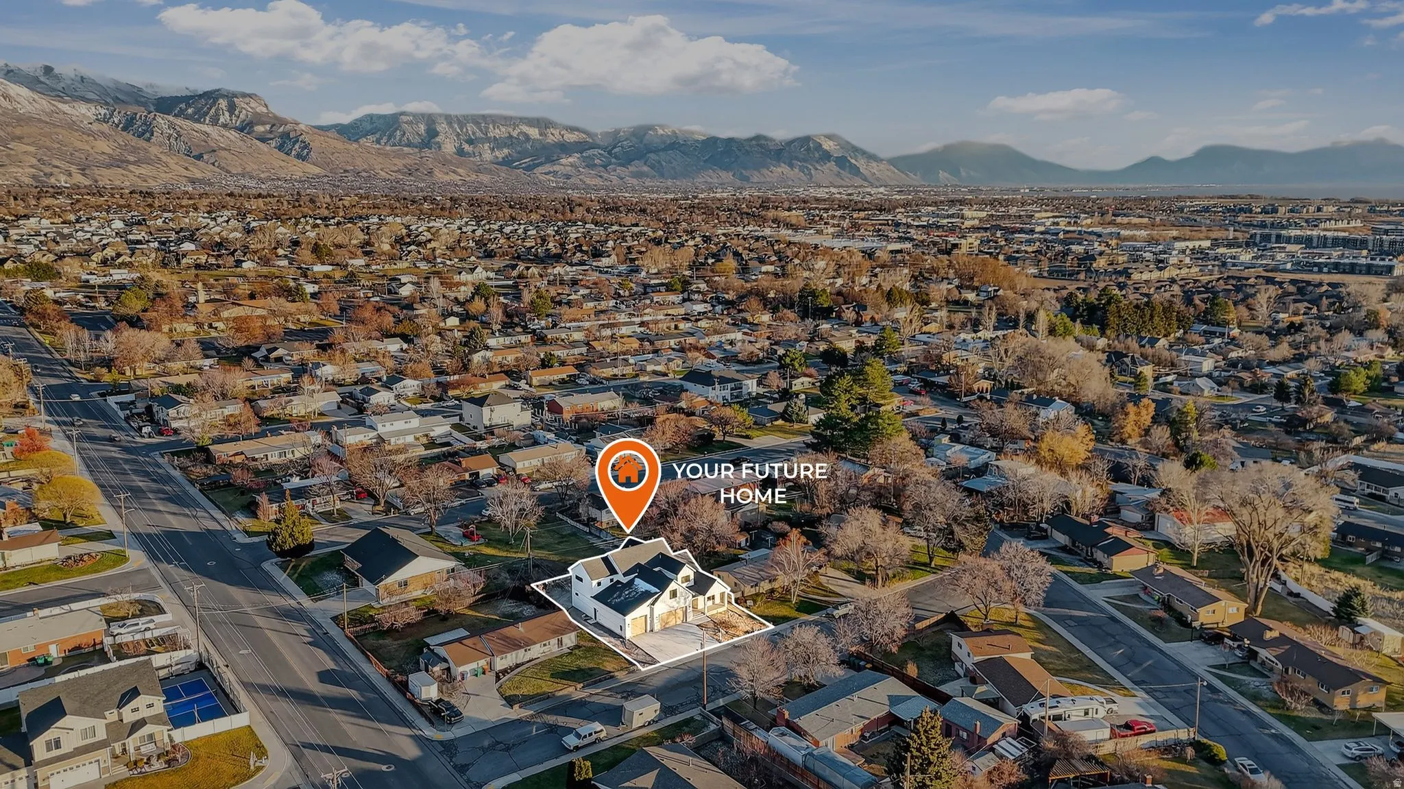 Aerial overview of property's location with a mountain backdrop and nearby suburban area, East Mountain Views!