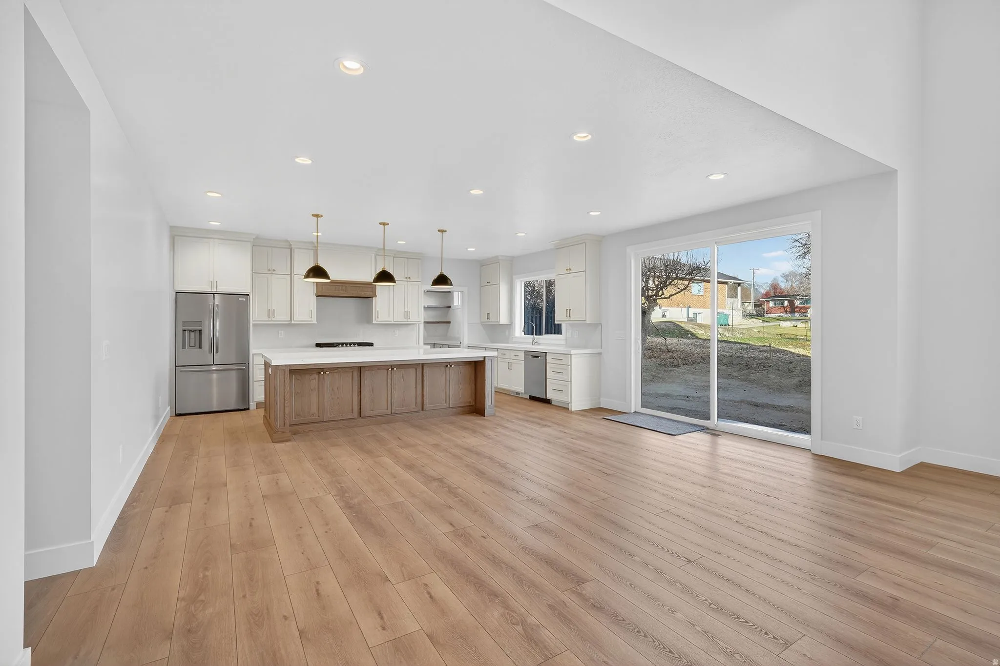 Large Dining space with unlimited table space and a 8' x9' slider out to patio