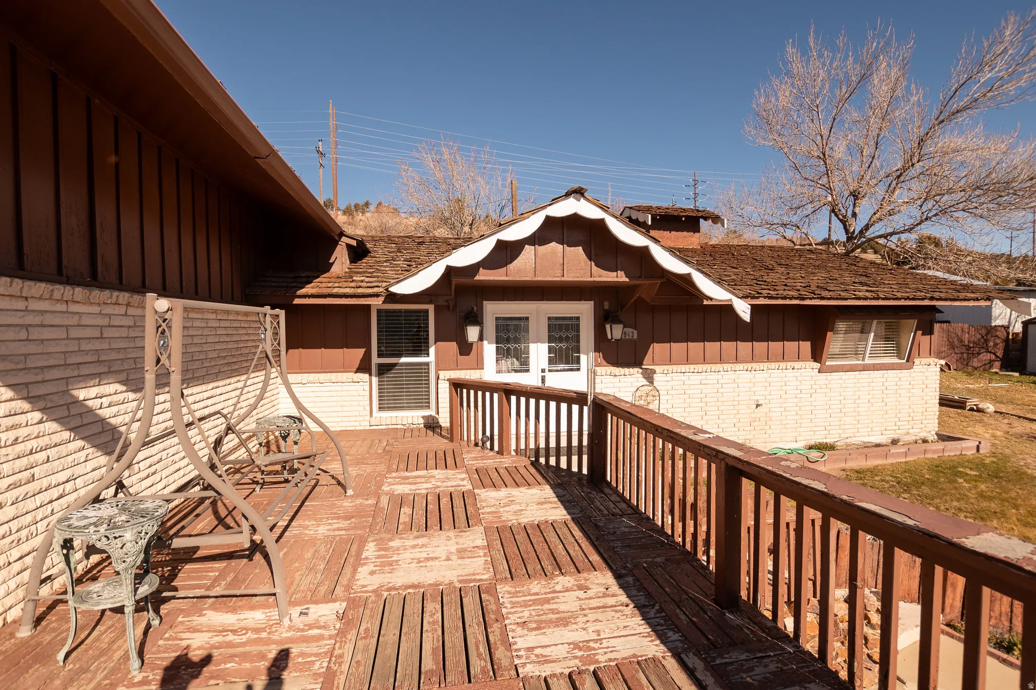 Wooden terrace with french doors