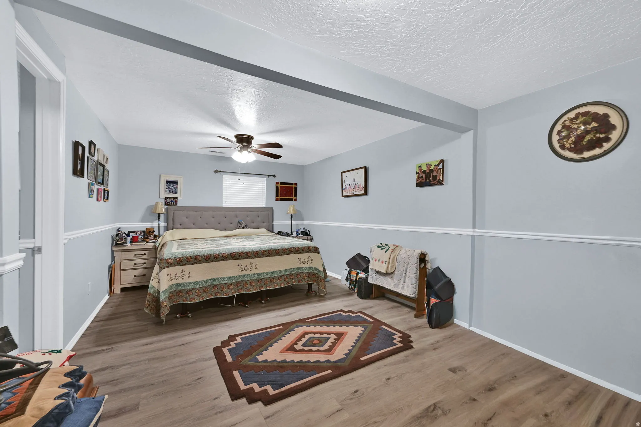 Bedroom in basement converted from 2 bedrooms into 1 large bedroom with a walk-in closet