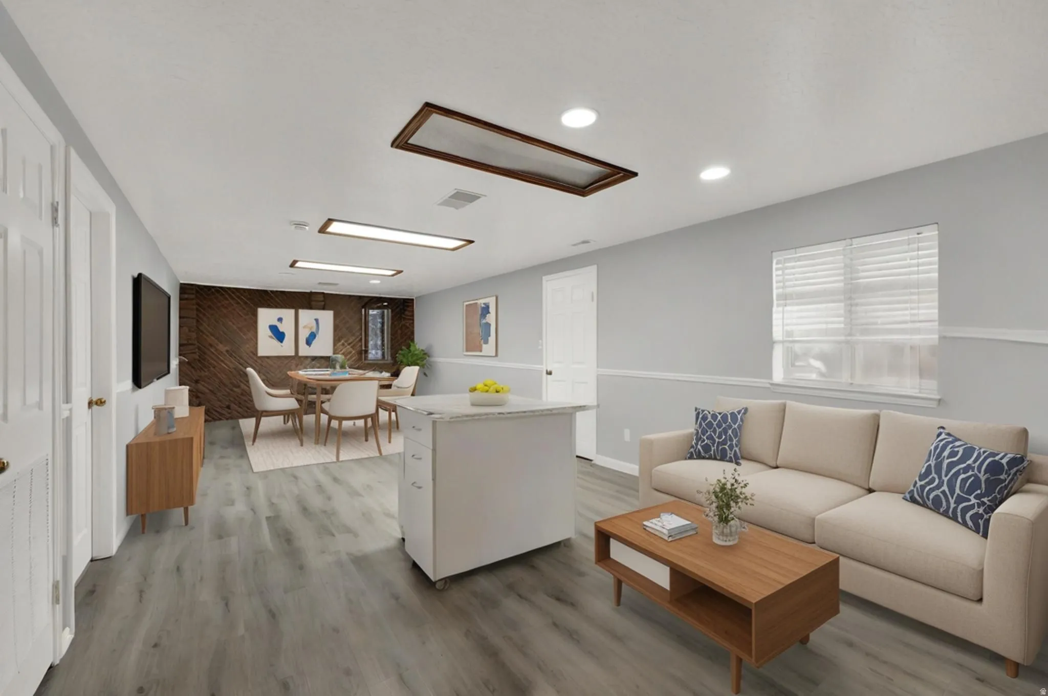Virtually stage rec room/ family room in basement with brick fireplace