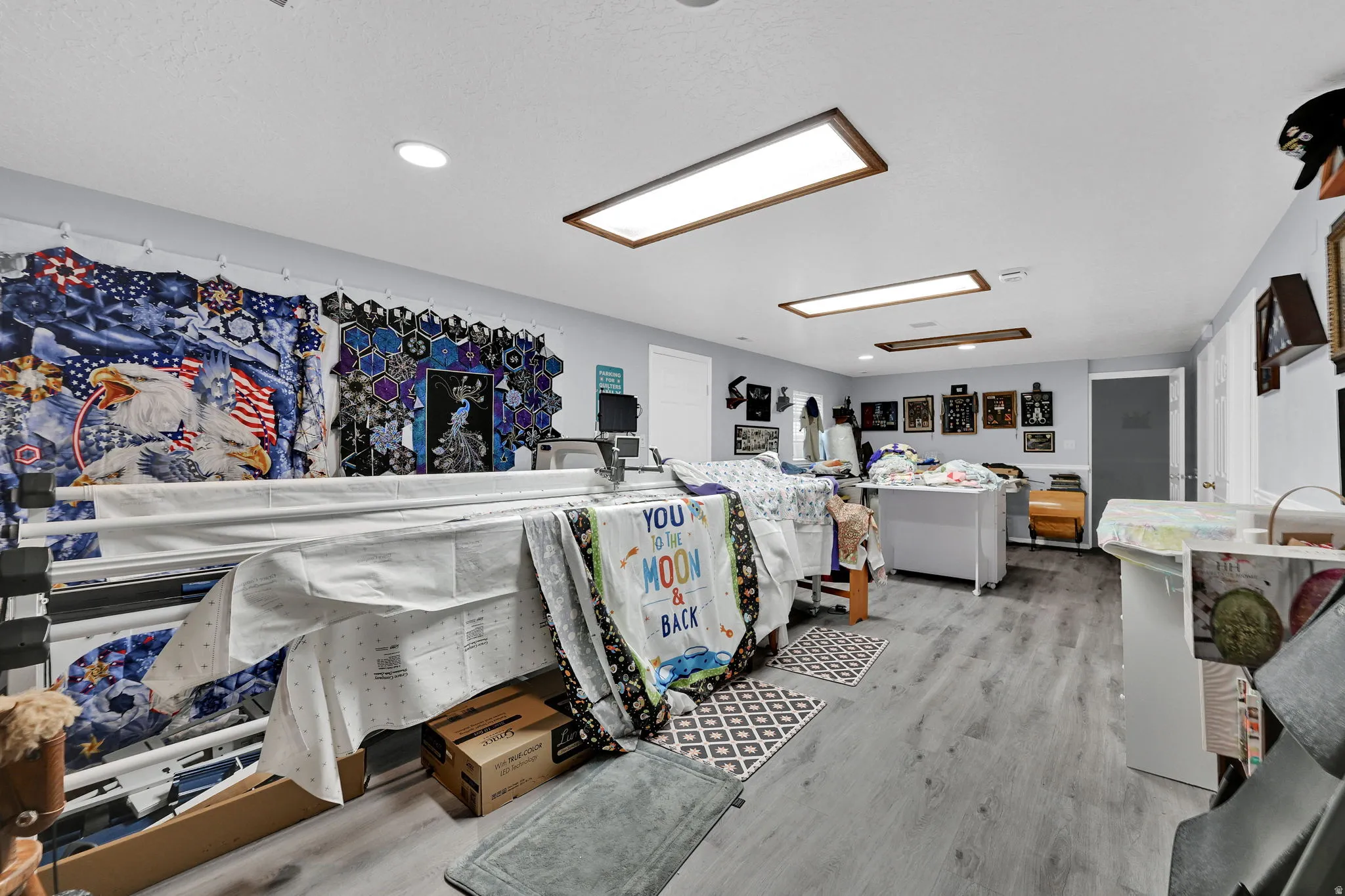 Rec room/ family room in basement currently being used as a craft room