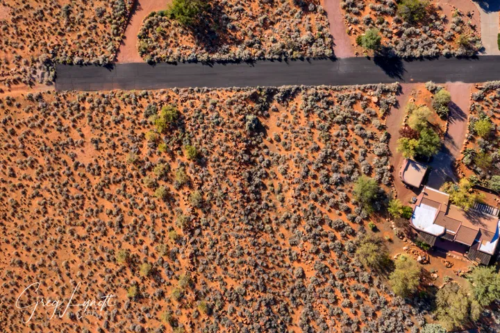 Aerial view of sparsely populated area featuring a desert landscape