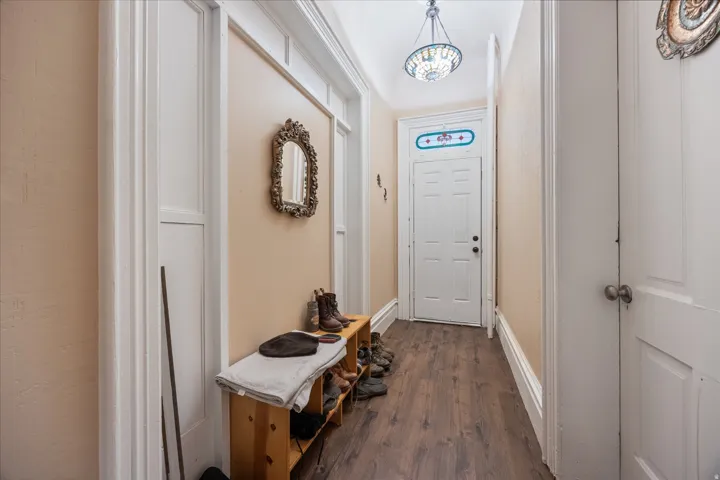 Doorway with wood finished floors