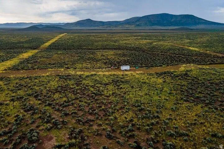 Drone / aerial view of a mountain backdrop
