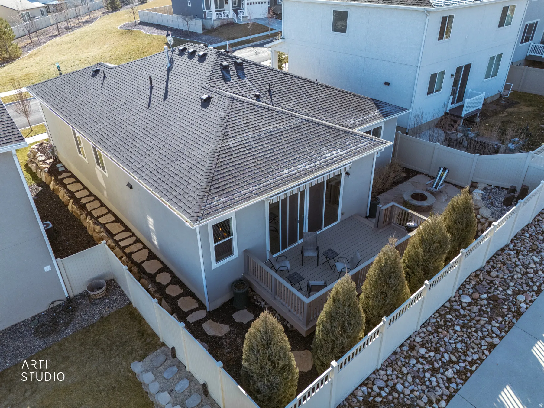Drone / aerial view with property custom wrap around flagstone walkway.
