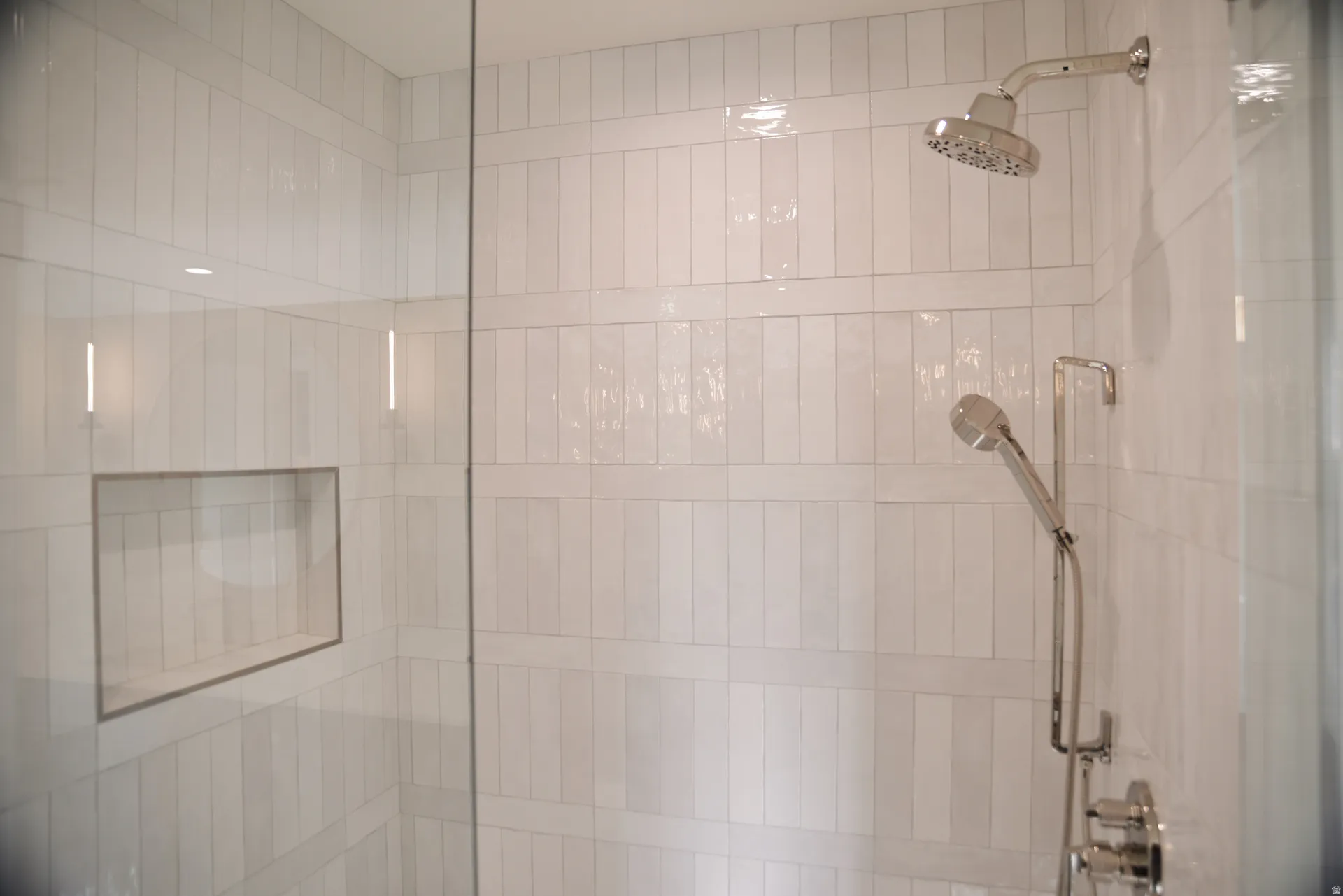 Bathroom with tiled shower and a relaxing sauna